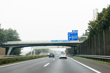Rear view of Skoda and VW cars driving fast on Austrian highwayのeditorial素材