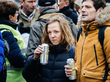 Protesters drinking light beer from cans at second demonstration against the new pension reform to be presented next month by French Prime Minister Elisabeth Borneのeditorial素材