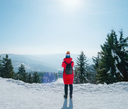 Woman Exploring Germanys Black Forest in Winterの写真素材