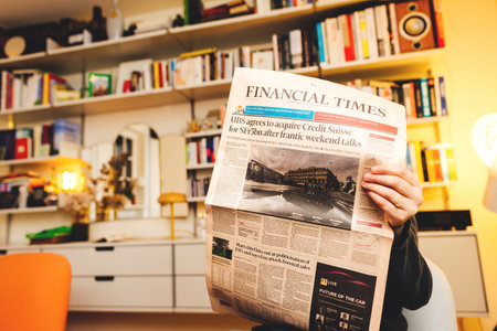 Financial Times British newspaper breaking news of UBS historic acquisition of rival Credit Suisse Group AGのeditorial素材