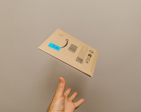 Receiving the Amazon Prime Delivery: a Studio Shotのeditorial素材