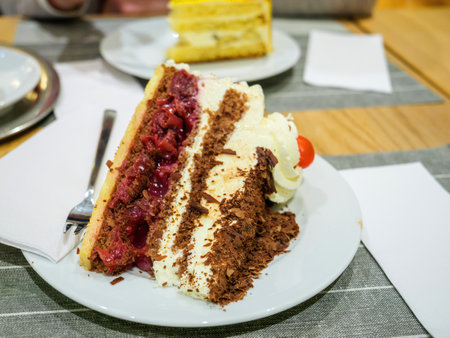 Appetizing black forest gateau on breakfast plateの写真素材