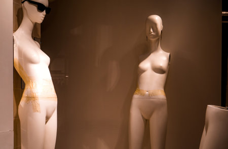 Empty retail window: Mannequins female silhouettesの写真素材