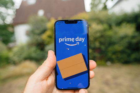 Amazon prime day shopping website promo on the liquid retina display - garden background