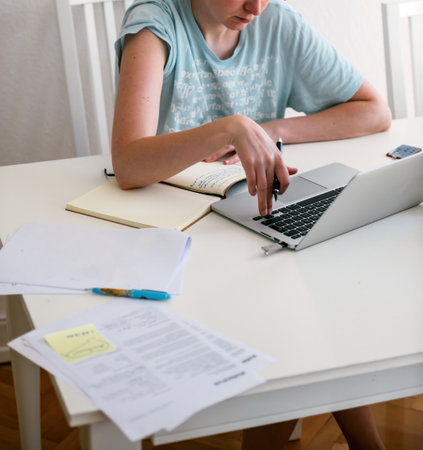 Relaxed Woman Preparing PhD Thesisの写真素材