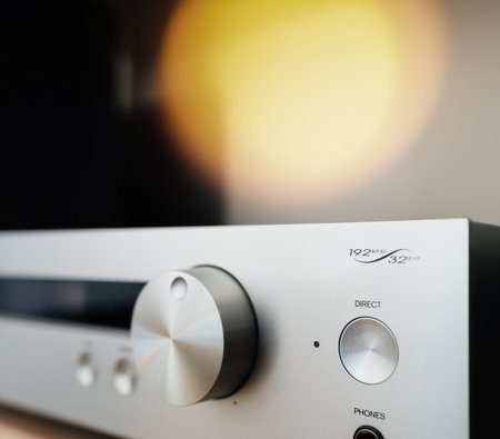 Paris, France - Jun 3, 2024: Separate 192 kHz-32-bit TI Burr-Brown DACs for each channel ensure accurate digital-to-analog conversion, with a direct button on the Onkyo P-3000R Reference Series amplifier, emphasizing high-fidelity audio performanceのeditorial素材