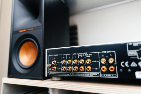 Paris, France - Jun 3, 2024: Analog RCA inputs, golden rhodium-plated, on the reference Onkyo...