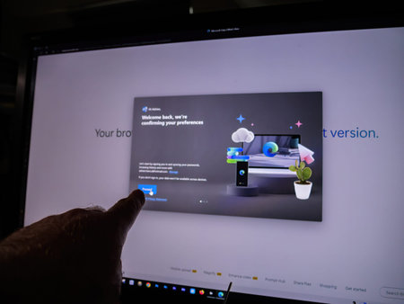 Paris, France - Apr 3, 2024: User syncing settings on Microsoft Edge across multiple devices,...