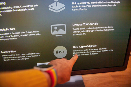 Frankfurt, Germany - Oct 20, 2020: Apple TV screen showing new features like Camera View, Picture in...