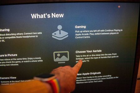Paris, France - Seb 29, 2022: A close-up of an Apple TV screen displaying the What New section with...