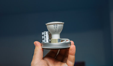 Paris, France - Oct 11, 2020: A close-up view of a Philips Hue GU10 lamp equipped with Zigbee technology, showcasing its design and connectivity features for smart home integrationのeditorial素材