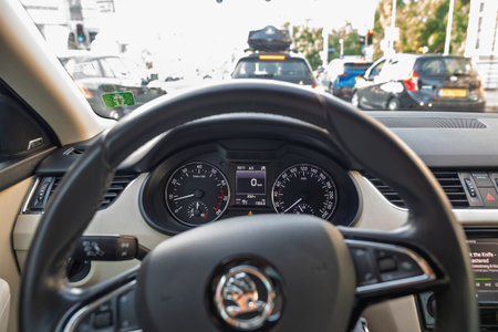 Alkmaar, Netherlands - Aug 30, 2024: A car dashboard displays all indicators and 0 km speed during a...