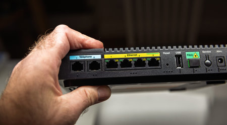 Paris, France - Nov 19, 2021: Close-up of the back panel of the Orange Livebox 5 router, showing...