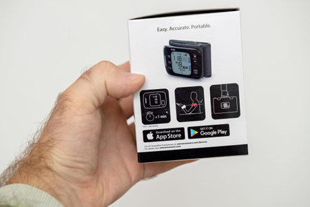 Paris, France - Oct 5, 2021: Packaging of Omron RS7 Intelli IT blood pressure monitor featuring app...