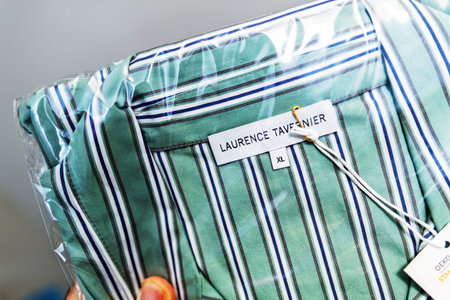 Paris, France - Dec 3, 2024: Laurence Tavernier striped pajamas in packaging with visible tags and...