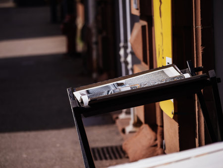 A table displays wallpapers, offering a variety of choices to enhance home interiors.の写真素材