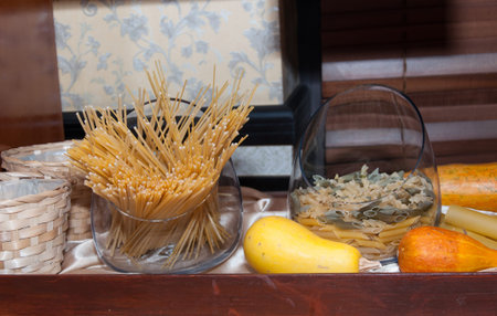 Spaghetti and pasta in some jars, ready to be cookedの写真素材