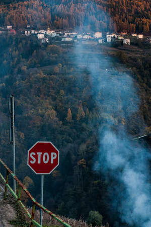 smoke in a wooded valleyの写真素材