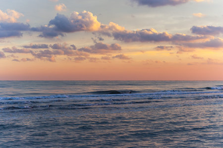 sunset on the sea with red clouds