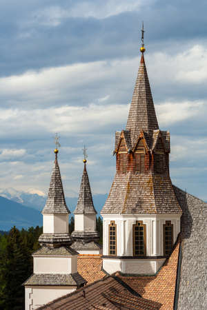 top of the bell tower of a mountain sanctuaryの写真素材