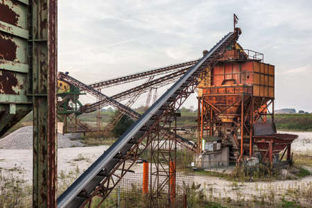 river dredging system with gravel pilesの写真素材