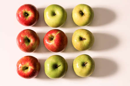 geometric composition of red and green applesの写真素材