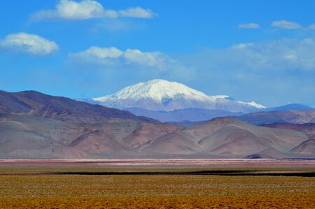 Beautiful snowy mountain in the Pocitos salt flat valley. Salta, Argentinaの写真素材