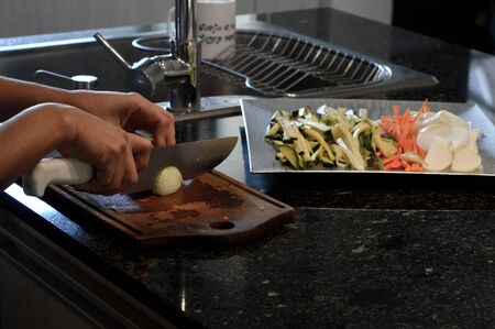 Cooking healthy food at home in coronavirus COVID 19 quarantineの写真素材