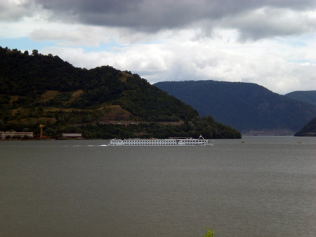 Cruise ship on Danube River on Iron Gates I lake in Orsova, Romaniaの写真素材