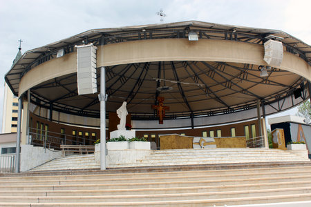 Outdoor altar with statue and crucifix at Medjugorje churchの写真素材