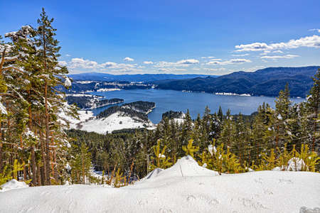Amazing winter scene, Dospat lake Rhodope mountains, Bulgariaの写真素材