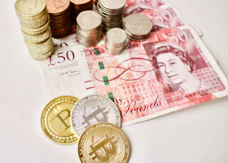 Bitcoin coins and poundsの写真素材