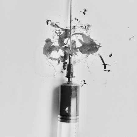 Syringe with needle. Black & white art concept.の写真素材