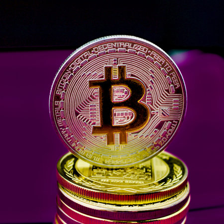 Cryptocurrency physical silver bitcoin coin on money tower.の写真素材