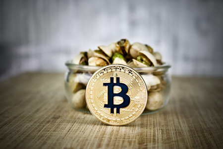Digital currency physical gold bitcoin coin - nuts concept
