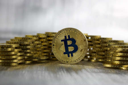 Digital currency physical gold bitcoin coin money concept.のeditorial素材