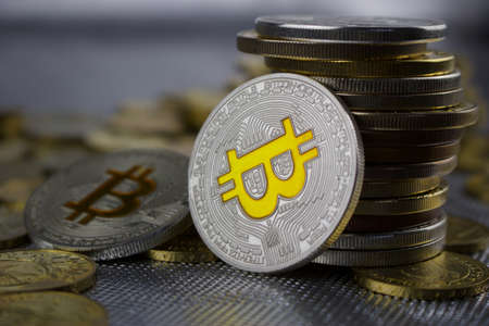 Cryptocurrency physical silver bitcoin coin in money concept.のeditorial素材