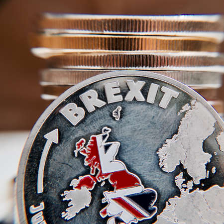 Europe leaving. Brexit coin with british map. Article 50. Union.の写真素材