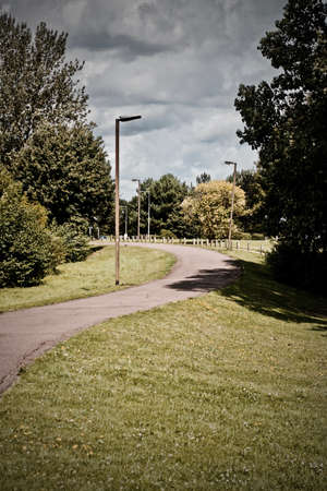 Public footpath in green outdoor park. Milton Keynes. Bedfordshire.の写真素材