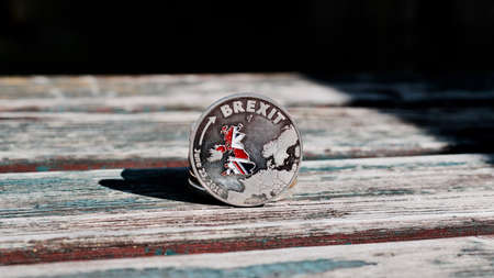 Metal brexit coin. Europe leaving. Article 50. Immigrants.の写真素材