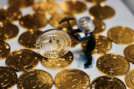 Digital currency physical metal bitcoin coin. Business mining concept.の写真素材