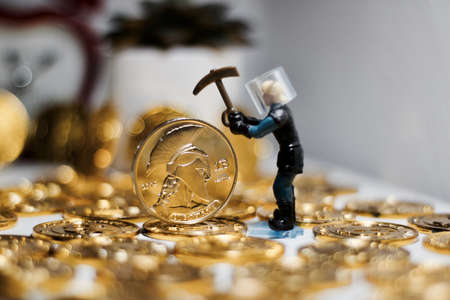 Digital currency physical metal bitcoin coin. Business mining concept.の写真素材