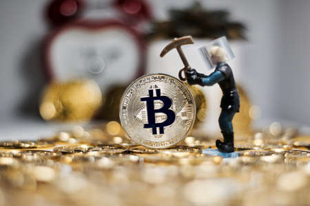 Digital currency physical metal bitcoin coin. Business mining concept.の写真素材