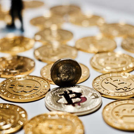 Cryptocurrency physical metal bitcoin coin. Digital currency virtual money concept.の写真素材