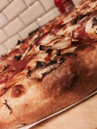 Delicious and fresh italian pizza with vegetables, jalapeno and pepperoni.の写真素材