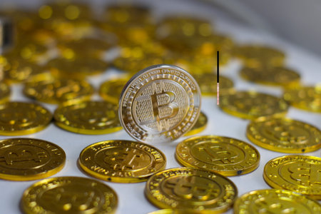 Cryptocurrency physical metal bitcoin coin. Digital currency virtual money concept.の写真素材
