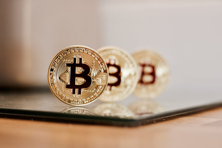Digital currency physical metal bitcoin coin. Cryptocurrency cash concept.