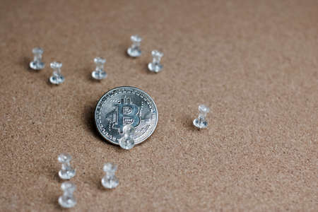 Digital currency physical metal bitcoin coin. Cryptocurrency cinema concept.の写真素材