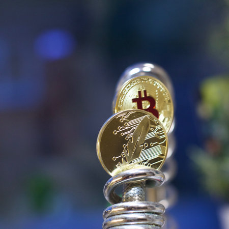 Digital currency physical metal bitcoin coin. Cryptocurrency cash concept.の写真素材