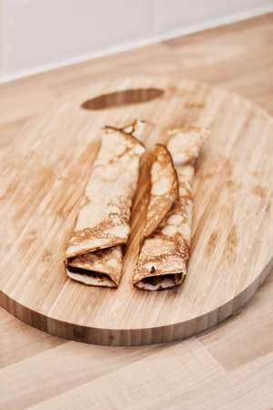 Tasty and delicious pancakes in the kitchen. Cooking concept.の写真素材